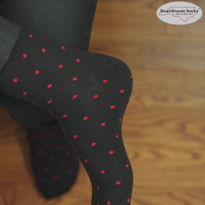 video of black and red polka dot dress socks from Boardroom Socks