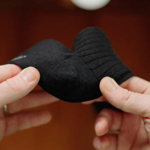 video detailing black merino wool over the calf dress socks from Boardroom Socks