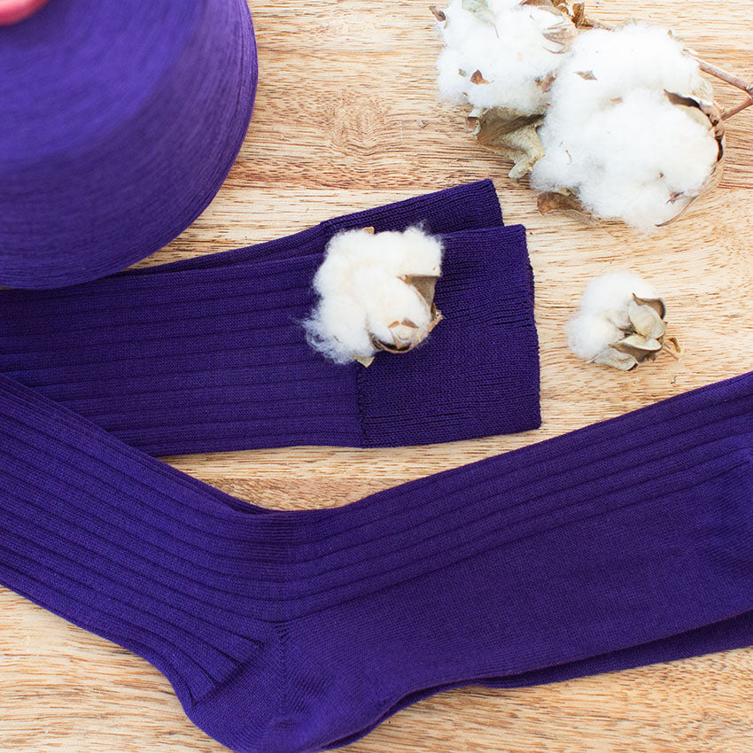 purple over the calf socks with cotton bolls and cotton yarn