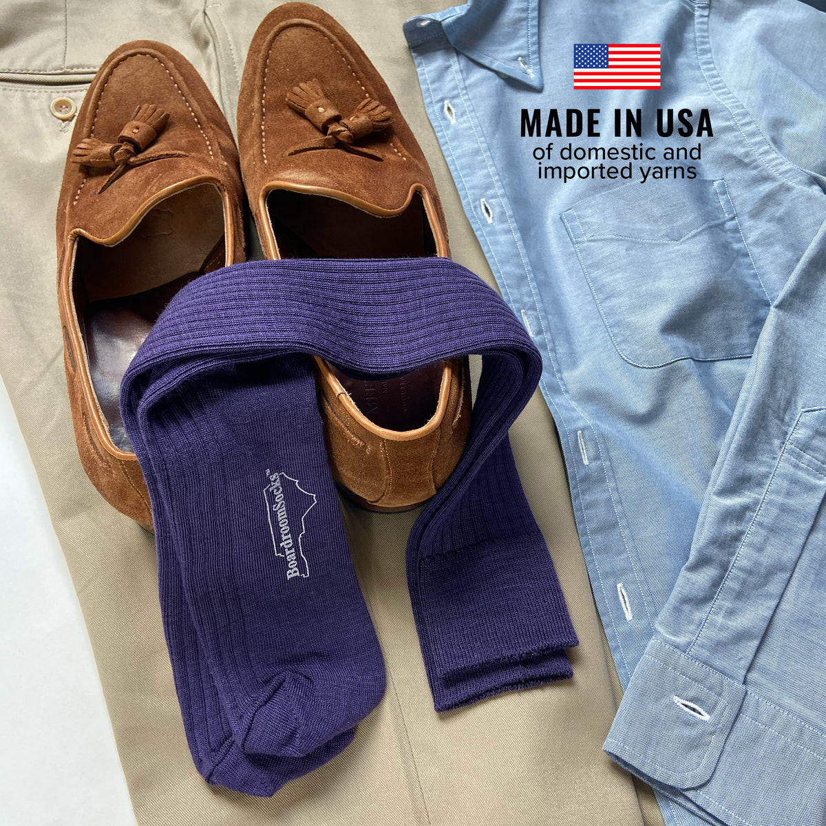 pair of purple merino wool over the calf dress socks from Boardroom Socks atop casual outfit