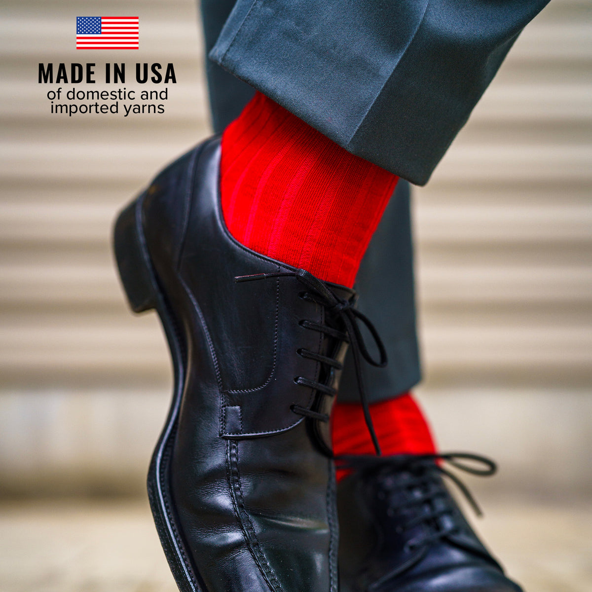 bright red merino wool dress socks with grey slacks and black dress shoes