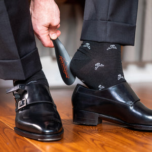 Jolly Roger dress socks with charcoal grey slacks and black double monkstrap shoes