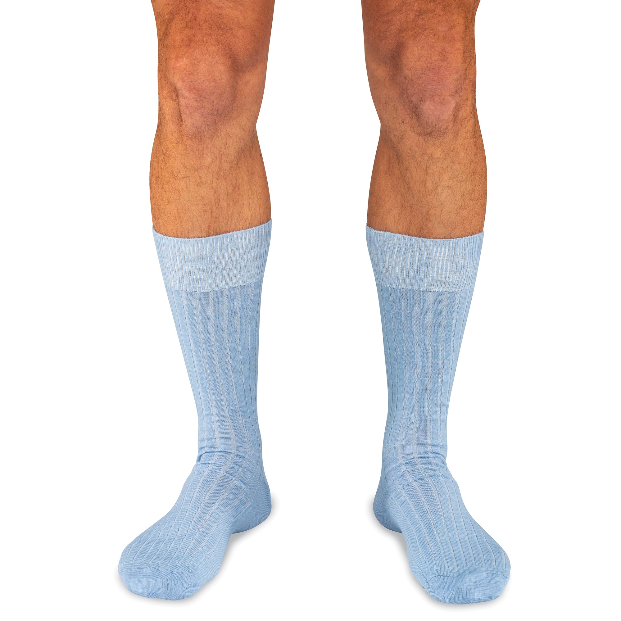 model wearing mid-calf length light blue merino wool dress socks