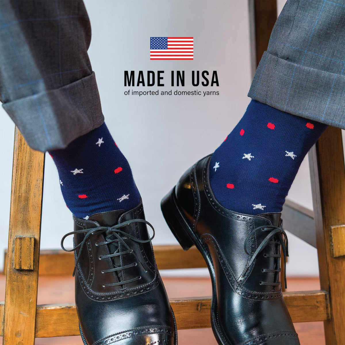 cotton star and dot patterned dress socks worn with nice shoes with american flag image and "made in the USA" overlay