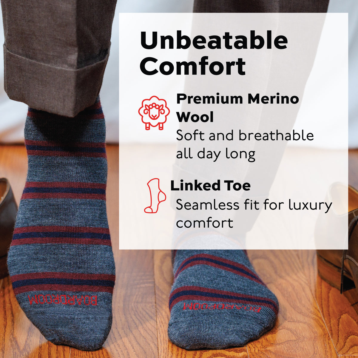 man standing on hardwood floors with his shoes off wearing Burgundy and Navy Stripes on Grey Merino Wool Mid-Calf Dress Socks