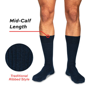 model wearing mid-calf length navy merino wool dress socks with a call out 