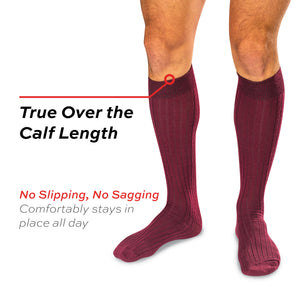 model wearing burgundy merino wool over the calf ribbed mens dress socks on a white background