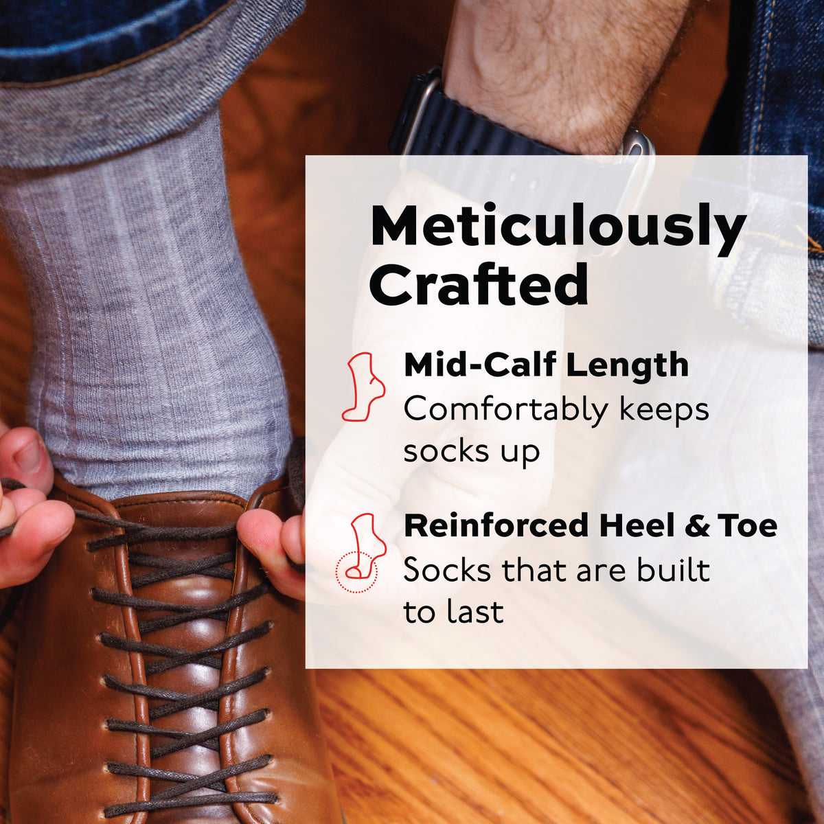 man putting on a shoe wearing light grey heather merino wool dress socks