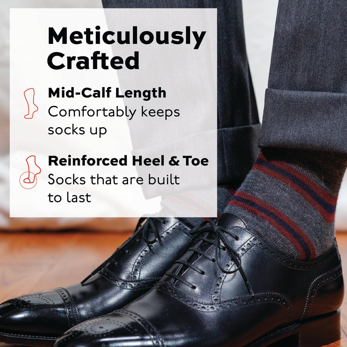 man wearing black dress shoes and Burgundy and Navy Stripes on Grey Merino Wool Mid-Calf Dress Socks with grey pants