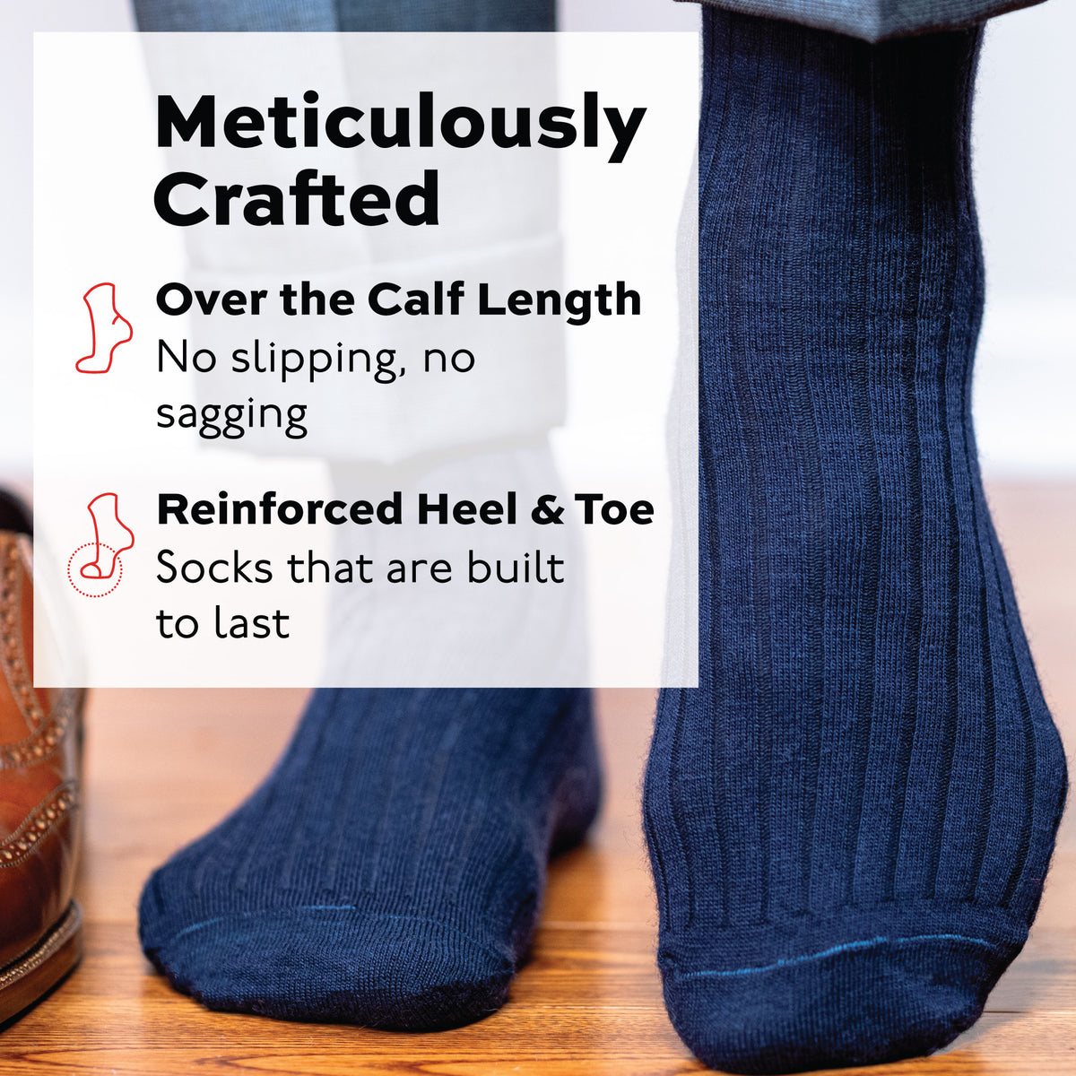 man standing on wood floor wearing navy wool over the calf mens ribbed dress socks