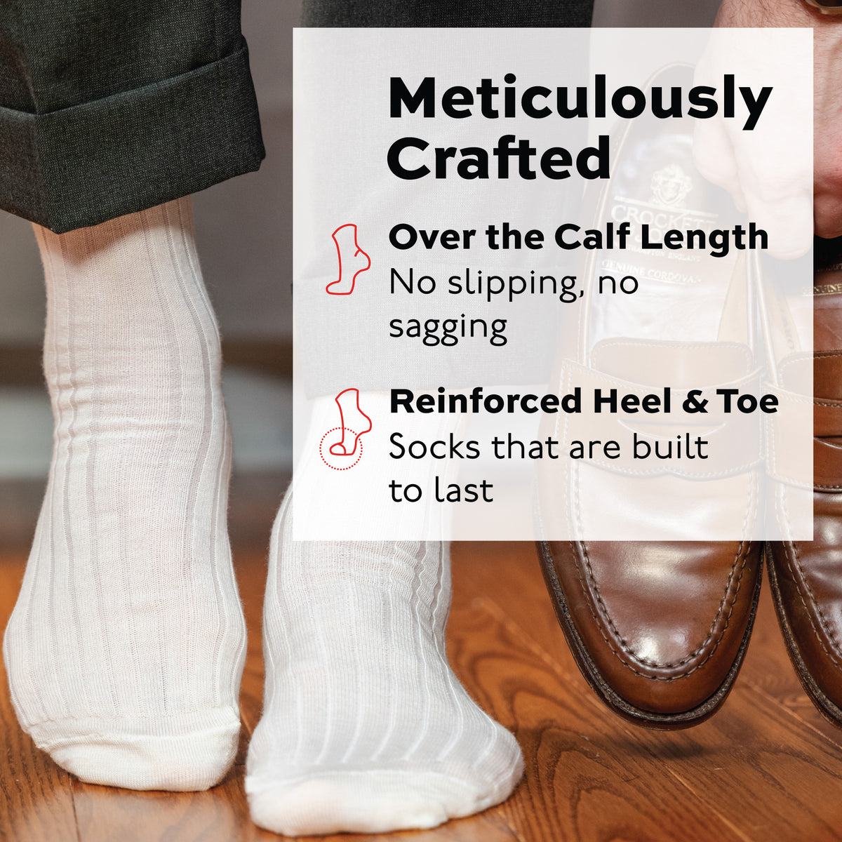 person wearing natural merino wool over the calf ribbed mens dress socks standing on hardwood floors