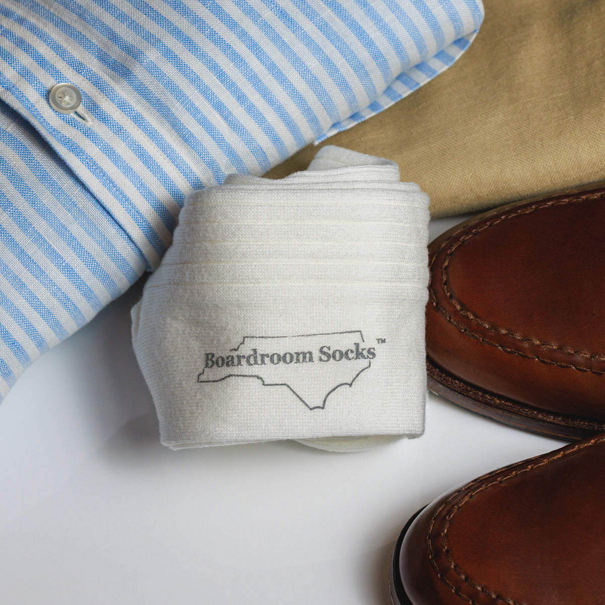 pair of white cotton dress socks from Boardroom Socks paired with casual outfit