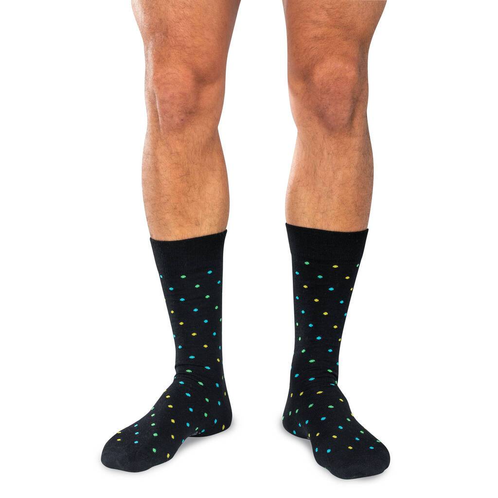 Man Wearing Mid-Calf Length Black Patterned Dress Socks