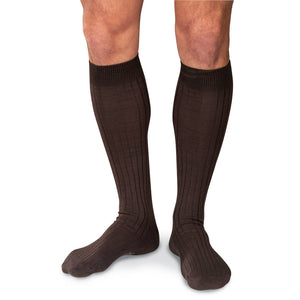 man wearing brown cotton over the calf dress socks