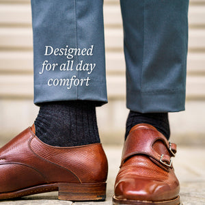 charcoal grey wool dress socks with navy trousers and brown leather monkstrap shoes