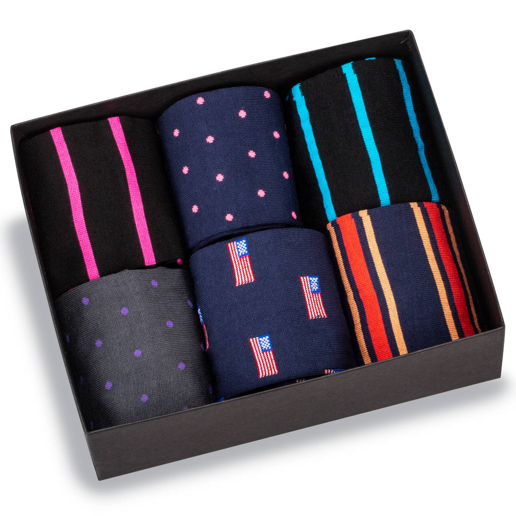 gift box filled with six pairs of colorful over the calf cotton dress socks for men