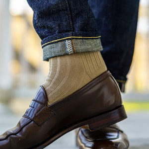 khaki merino wool dress socks with jeans and brown penny loafers