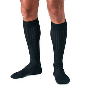 model wearing black over the calf merino wool dress socks