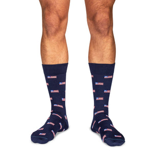 model wearing mid-calf length American flag dress socks