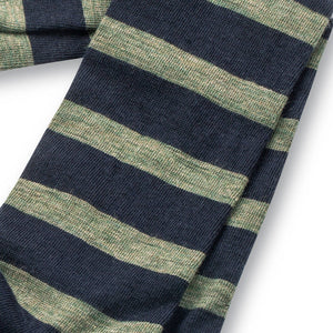close up photo of olive and navy striped dress socks