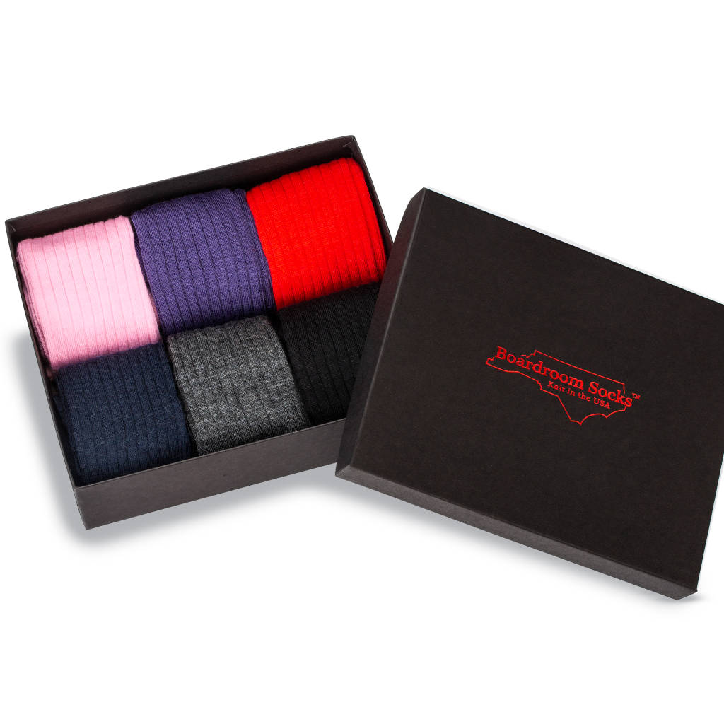 opened gift box filled with colorful merino wool men's dress socks